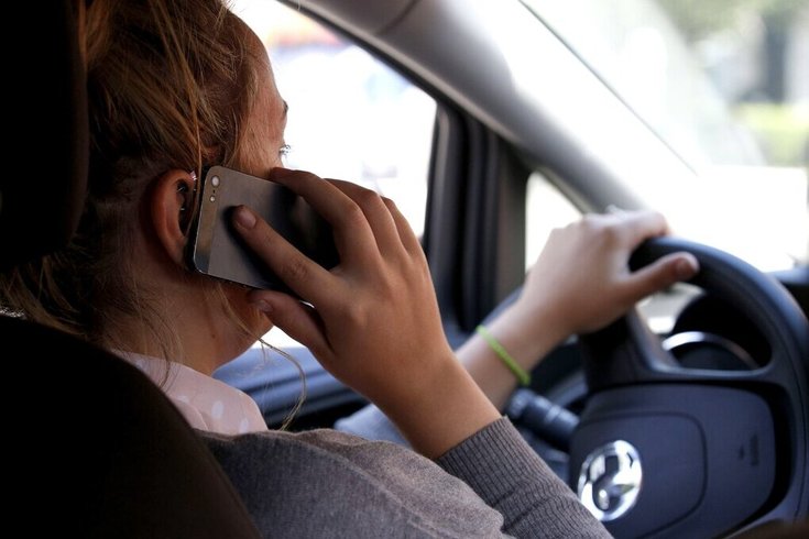 State House votes to ban use of hand-held cellphones while driving ...