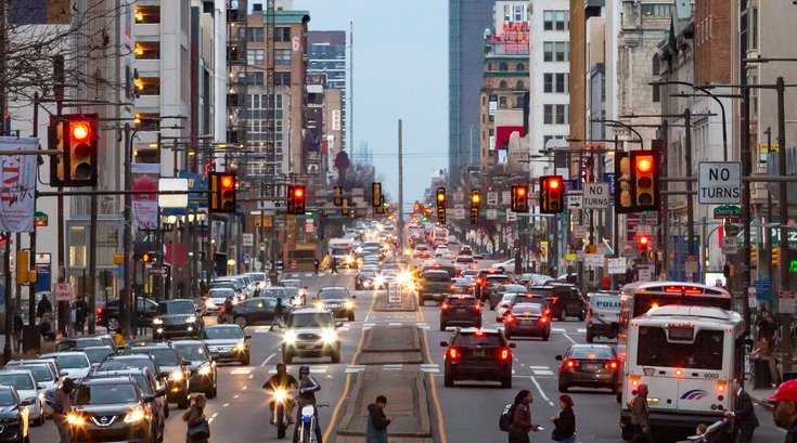 Carroll - Broad Street rush hour traffic and pedestrians