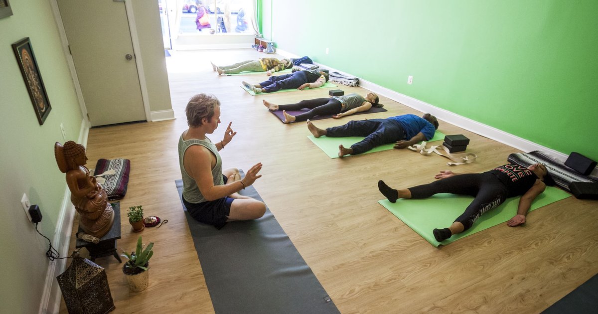 yoga-in-the-street  Root Down Yoga Studio