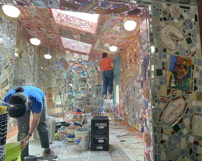 The second-floor dining room at Jim's Steaks, covered in colorful Isaiah Zagar mosaics.