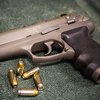 Stock_Carroll - Handgun with Bullets