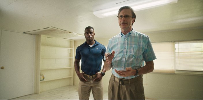 Actors Marchánt Davis and Josh Hamilton stand in a still from HBO's 'Reality.'