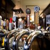 Stock_Carroll - Beer taps at Fado Irish Pub