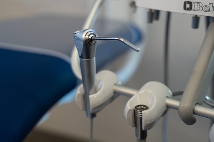 Alpha Dental settlement