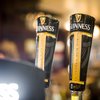 Stock_Carroll - Guinness beer taps at Fado Irish Pub