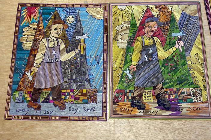 Two straw paintings of a man in a hat and apron in front of a sun and towers.