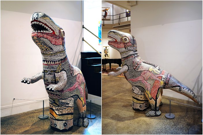 Side-by-side photos of 'Dinosaur,' a glass dinosaur figure painted in colorful patterns by artist Twins Seven-Seven