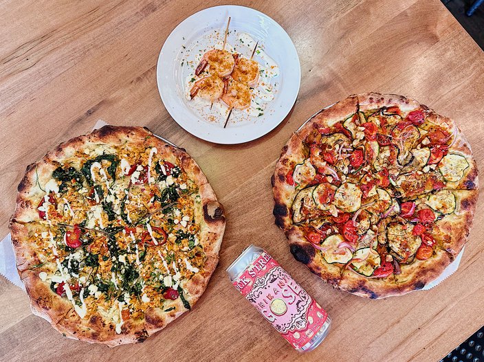 Dock Street South special AAJI's menu features two pizzas and shrimp skewers