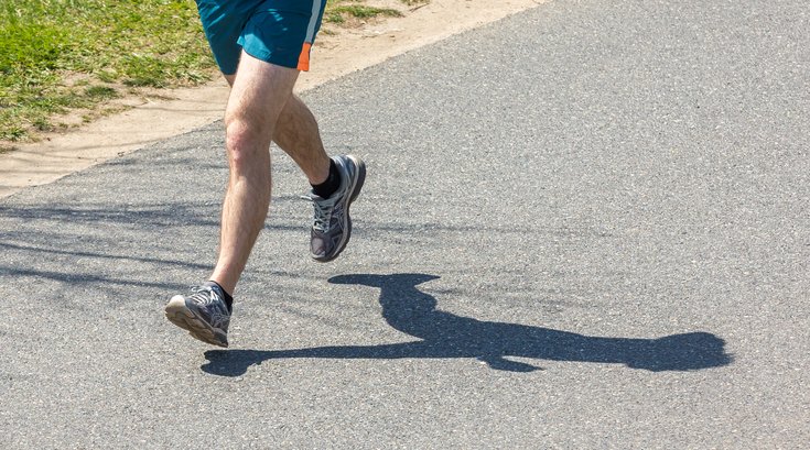 Stock_Carroll - Running on the Schuylkill River Trail in Philadelphia.