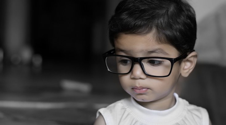Child wearing eyeglasses