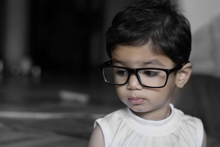 Child wearing eyeglasses