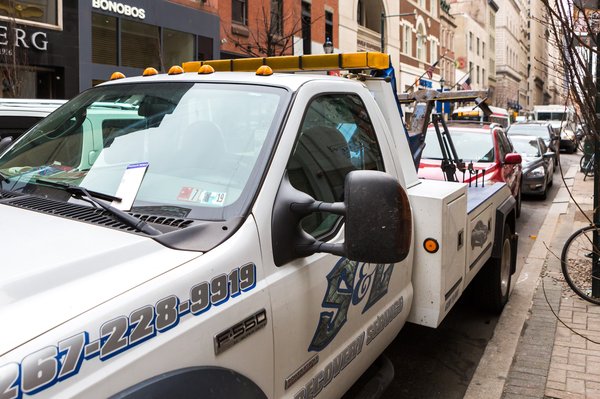 Carroll - Parking ticket on a tow tuck in Center City