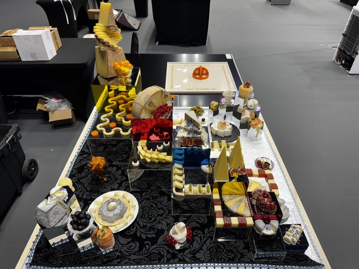 Display of cheese wedges and cubes