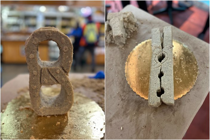 Sculptures of a soft pretzel and a clothespin made from scrapple