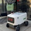 Woman blocks Uber robot