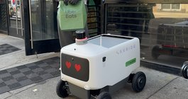 Woman blocks Uber robot