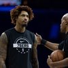 Kelly-Oubre-warmup-Sixers-staff_111125