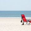Beach chair along the shore