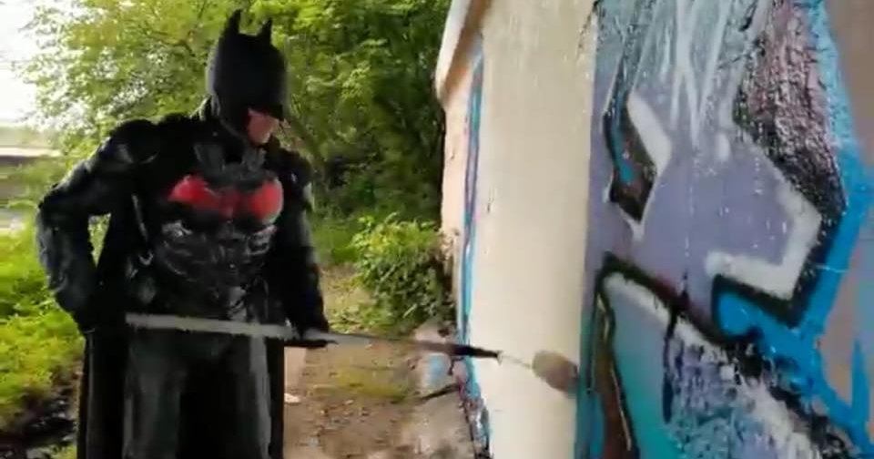 Batman' paints over graffiti in Philly suburbs | PhillyVoice