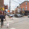Man walking a dog in South Philly - Passyunk