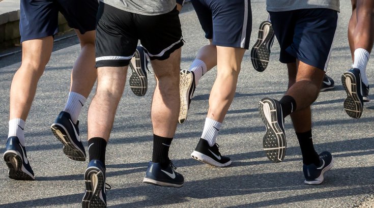 Group of men running in Philly