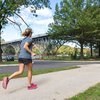 Woman running through a park in Philadelphia