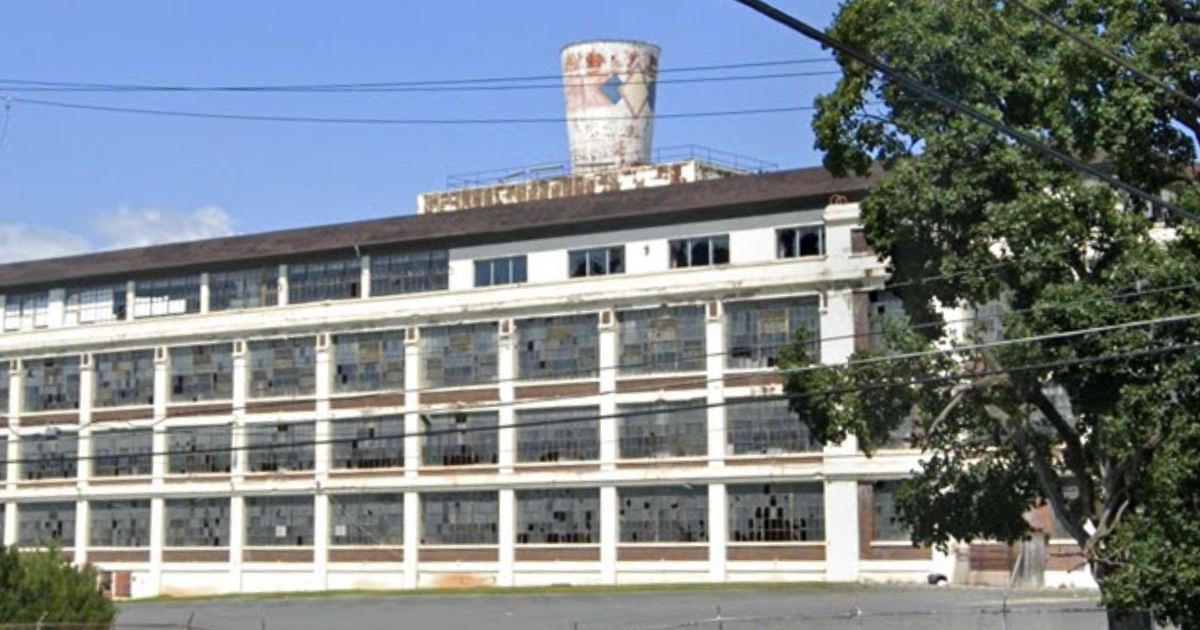 A 50,000 gallon Dixie Cup removed from roof of shuttered Lehigh Valley factory