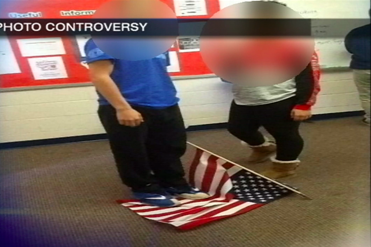 Pa. school investigating photo of student stepping on American Flag |  PhillyVoice