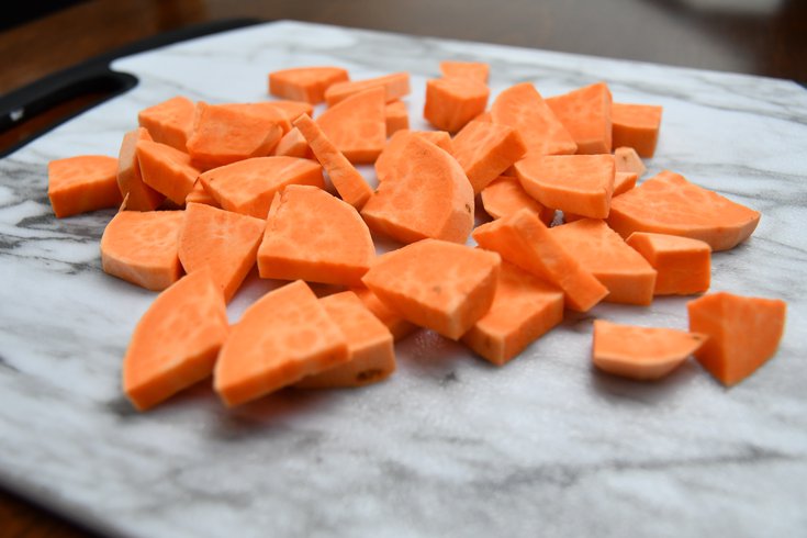 Sweet Potatoes on a Cutting Board