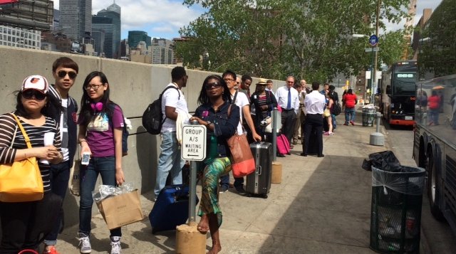 Passengers waiting for buses