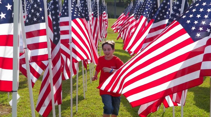 Limited - Child Running Through American Flags