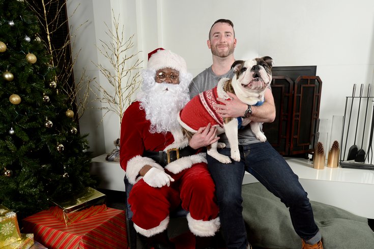 Pets pose for photos with Santa