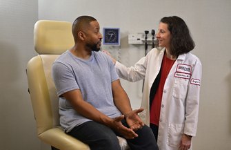 Limited - Fox Chase Cancer Center - Dorctor speaking with patient