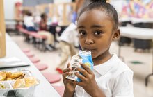 Limited - Student Drinking Milk at Philadelphia School