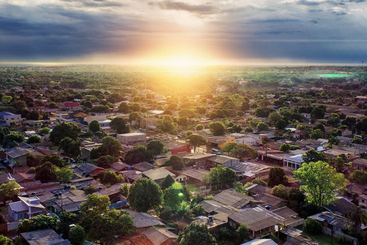 Aerial view of a town with sunset