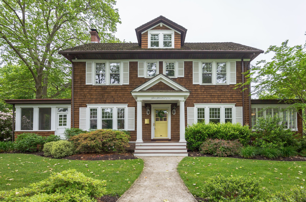 Limited - Houwzer Cedar home with white shutters