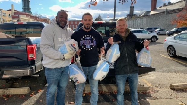 Limited - IBEW members handing out turkeys