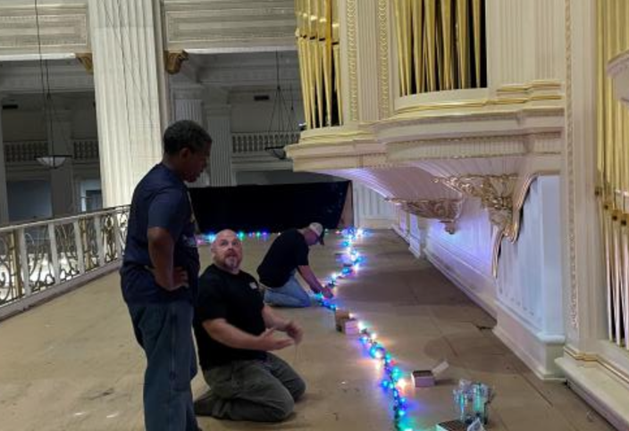 Limited - IBEW members working on the light show