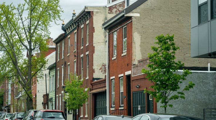 A Street in Philadelphia lined with cars