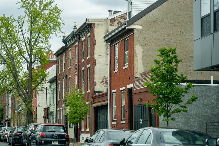 A Street in Philadelphia lined with cars