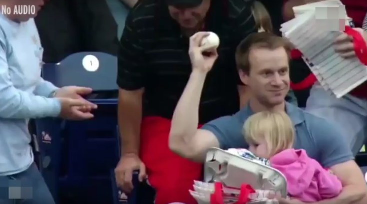 Dad catches ball. 