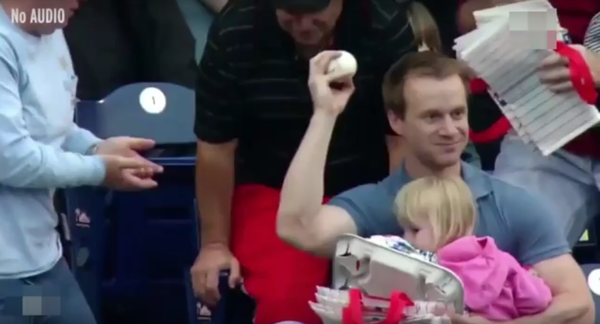 Dad catches ball. 