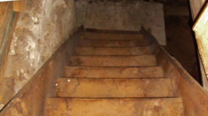 Limited - Stairs leading down to a basement