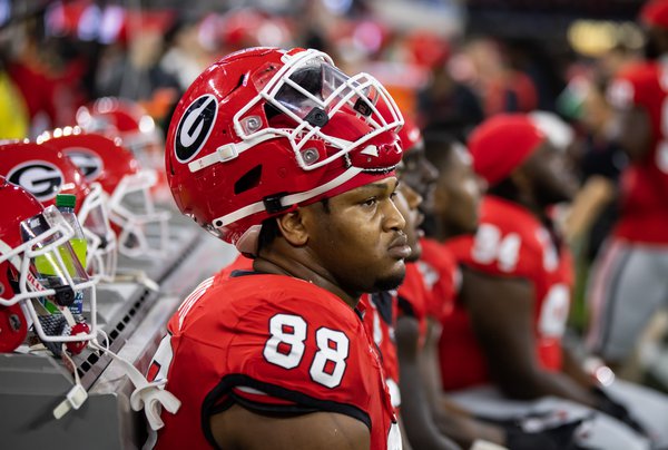 Georgia's Carter goes down with apparent cramping at pro day