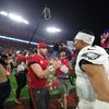 Baker-Mayfield-Jalen-Hurts-Handshake-Eagles-Bucs-NFC-Wild-Card-2023.jpg