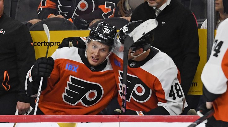 Matvei-Michkov-Morgan-Frost-Bench-Flyers-Islanders-Preseason-9.27.24-NHL.jpg