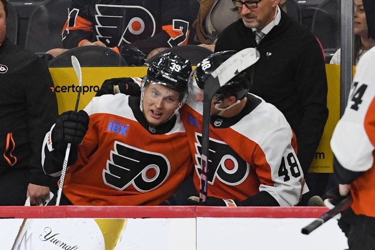 Matvei-Michkov-Morgan-Frost-Bench-Flyers-Islanders-Preseason-9.27.24-NHL.jpg