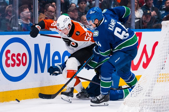 Denver-Barkey-Puck-Battle-Flyers-Canucks-1.30.25-NHL.jpg