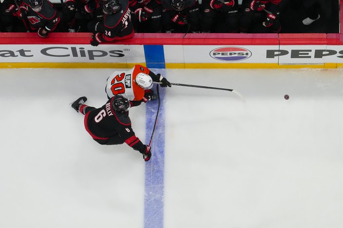Alex-Bump-Puck-Chase-Flyers-Canes-2026-Playoffs.jpg