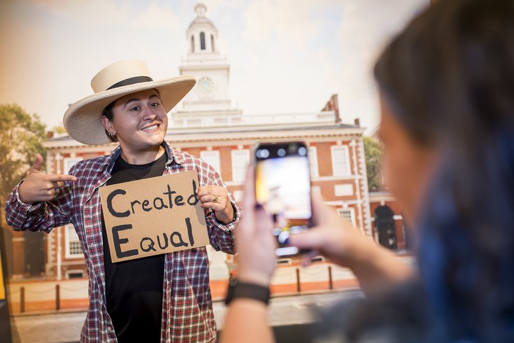 Visitor poses in The Declaration's Journey selfie station
